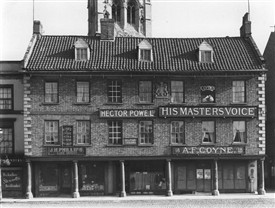Photo:Coyne's Music Shop in the old moot Hall on the north side of Newark Market Place (The tower of the parish church of St.Mary Magdalene may be seen behind)