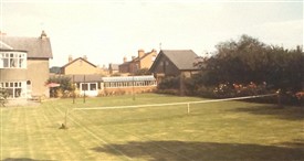 Photo:The tennis lawn at 'Fenimore' in the 1960s