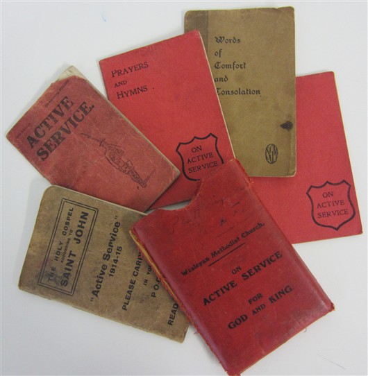 Photo:Five booklets (and protective wallet) given to soldiers by the Wesleyan Methodist Church - carried by Pte Dixon during his time at the front