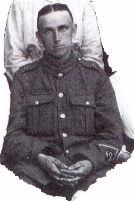 Photo:Detail from the group photo above:  So hasty was Pte Bell's return from the front mud from the trenches may be clearly seen on his hands