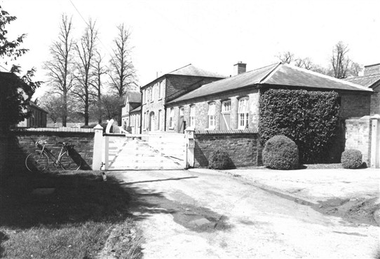 Photo:Former coach-house and stables at Thurgarton Priory.  The trees on the left mark the edge of the Priory churchyard