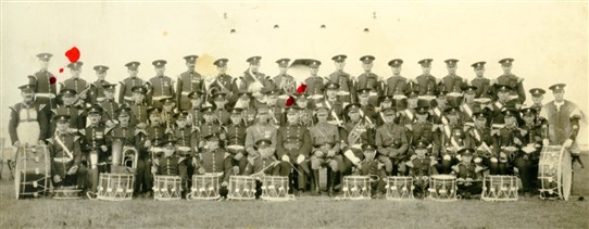 Photo:The Sherwood Foresters Regimental band with Bandmaster Arthur Frederick Coyne (front row middle, between drums).  Behind him is Frank Coyne, whilst Len Coyne is second from the left on the back row (with red spot above).