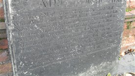 Photo:Tom Booth's epitaph, as transcribed in the text (left)